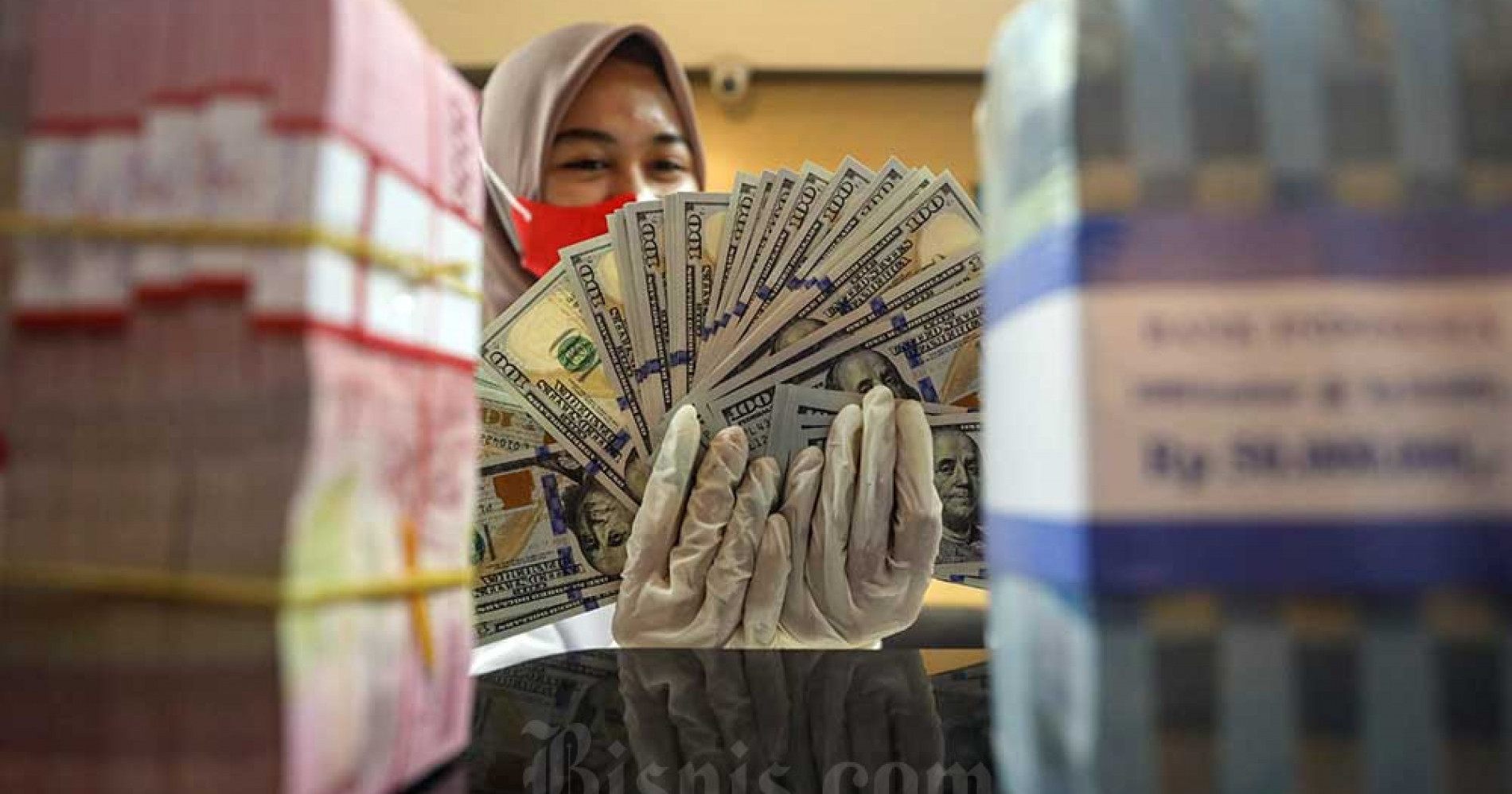 Kurs sempat melemah terhadap dolar Amerika Serikat (AS), Bank Indonesia melakukan beberapa langkah stabilisasi keuangan. (Sumber gambar: Bisnis.com/Arief Hermawan P)